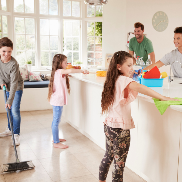 An image of parents and children completing household chores.