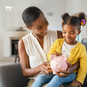 mom with her child holding a piggybank