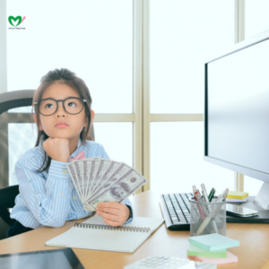 kid holding money