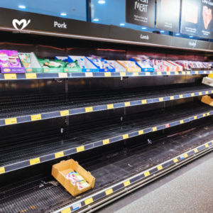 Empty Food and Product Shelves at a Supermarket