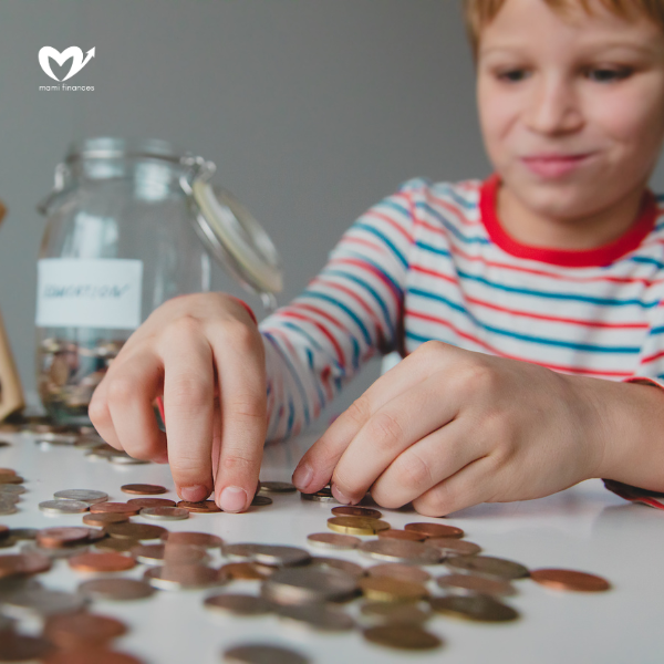 boy counting money, kid saving coins, personal finances for kids