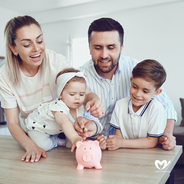 a family with piggy bank in front of them
